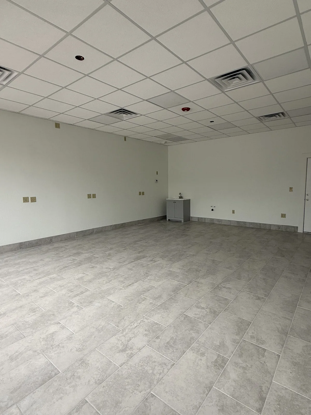 Unit 2 from the storefront, left side of the room