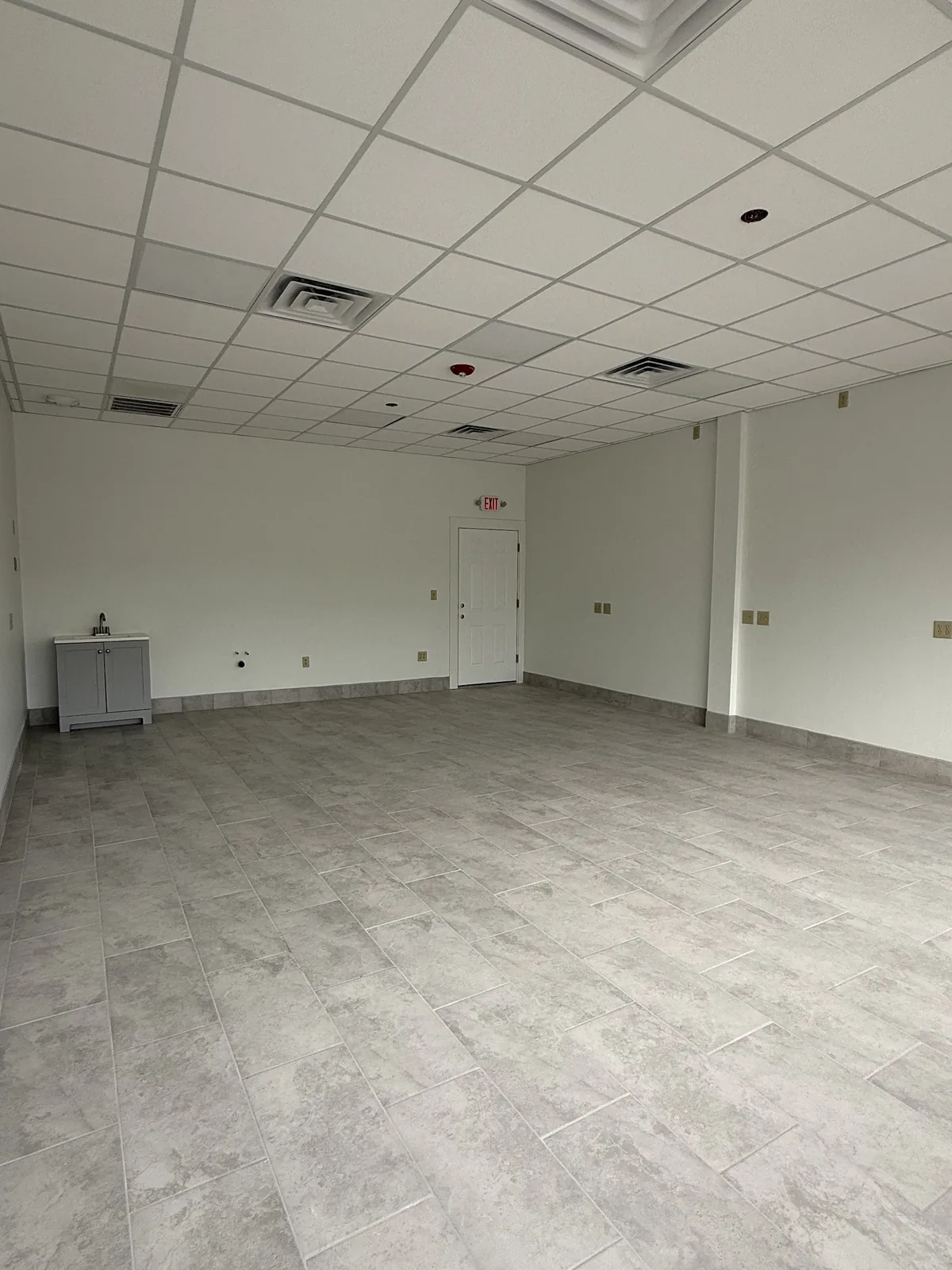 Unit 2 from the storefront, right side of the room